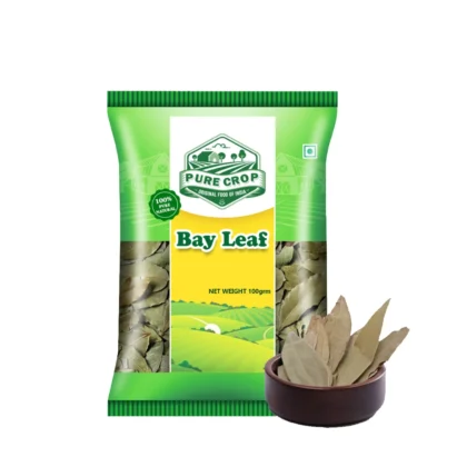 A small pile of whole, dried, greenish-brown Pure Crop Bay Leaves.
